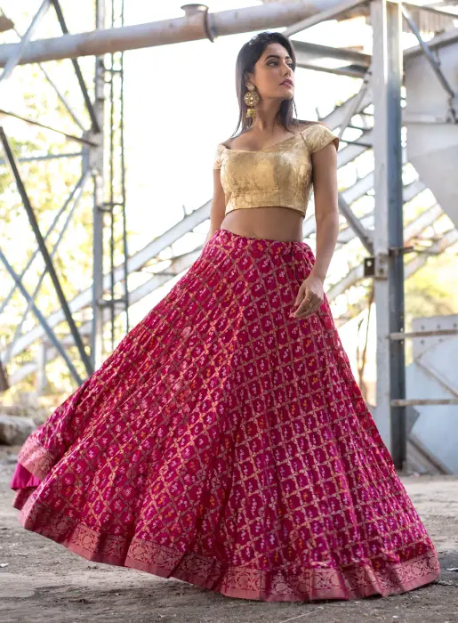 Magenta lehenga with off shoulder blouse